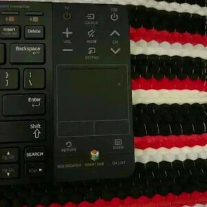 Samsung Bluetooth Keyboard with remote functionality & track pad. 2AA batteries